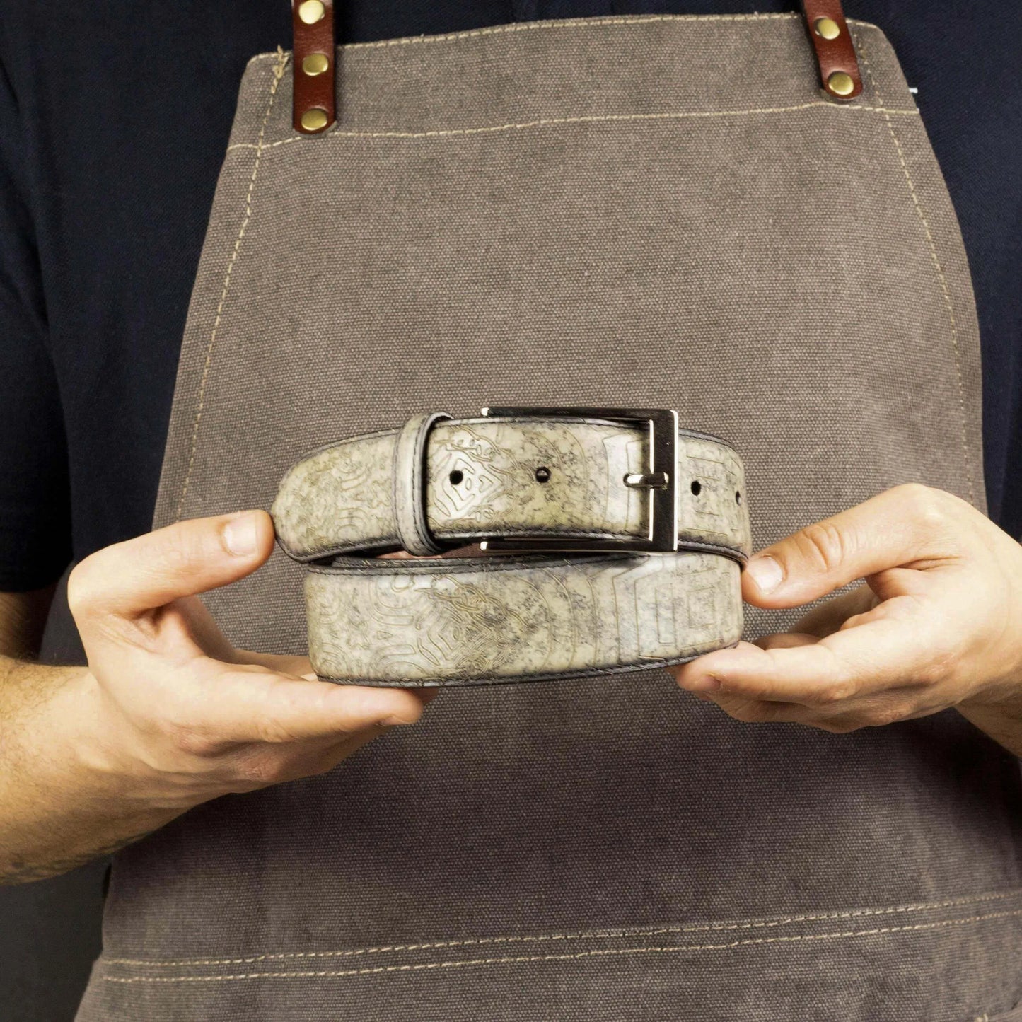 Gray patterned leather belt featured in Aztika Patina Hamptons Belt II for stylish look