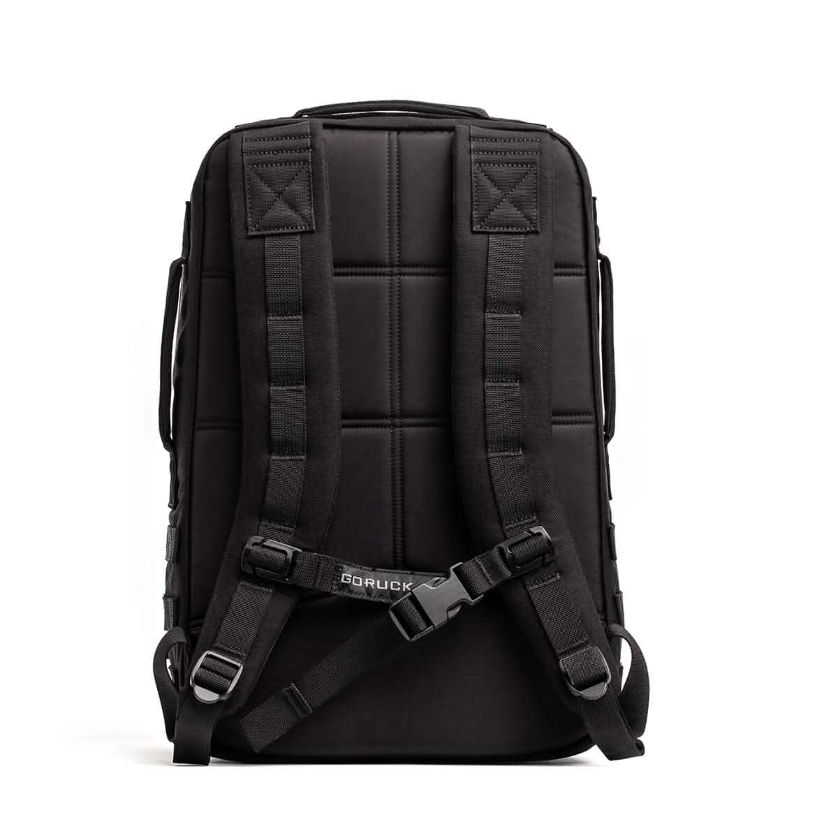 Back view of black GORUCK backpack with padded straps and sternum buckle for men