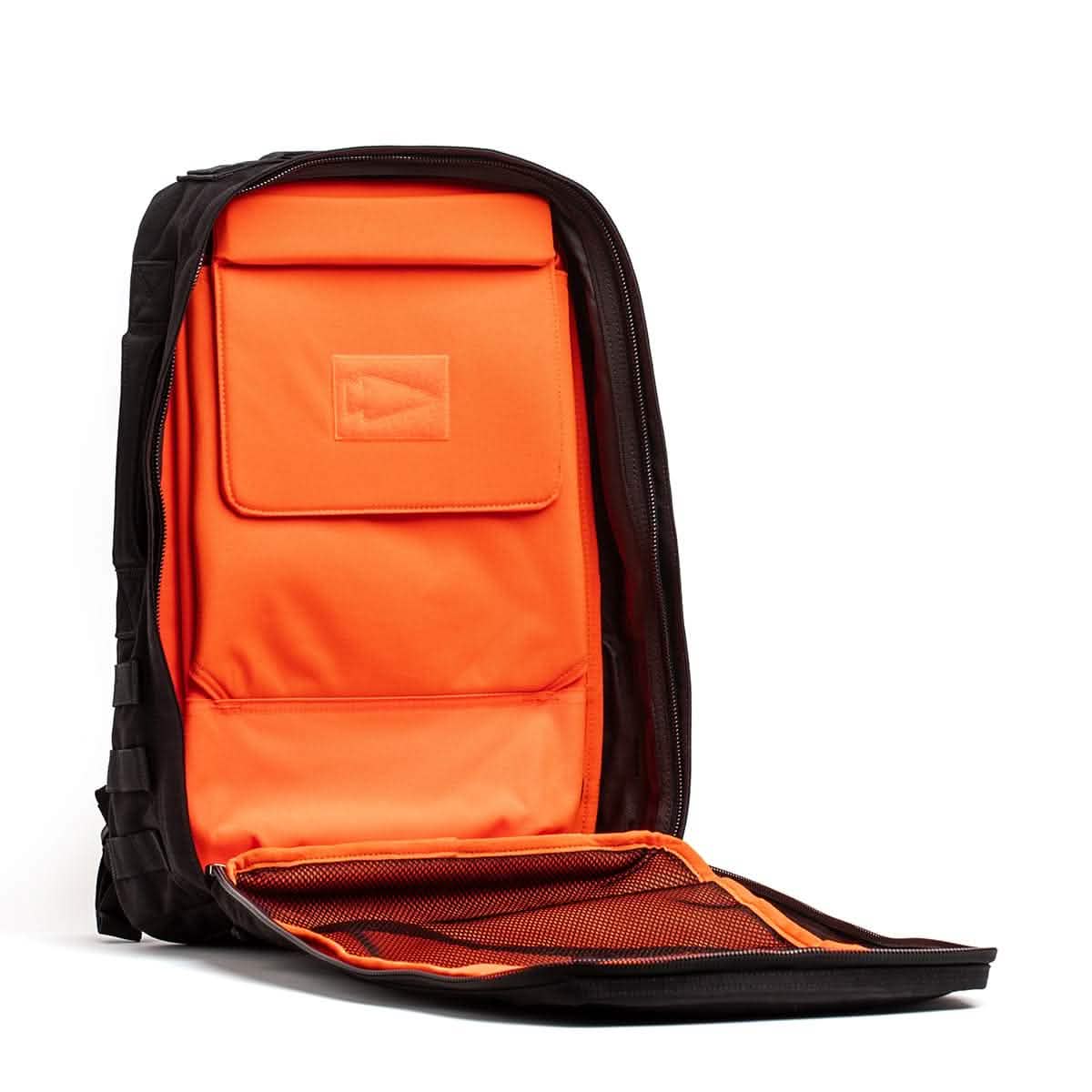 Open black backpack with bright orange interior, laptop sleeve, and mesh pocket, for men