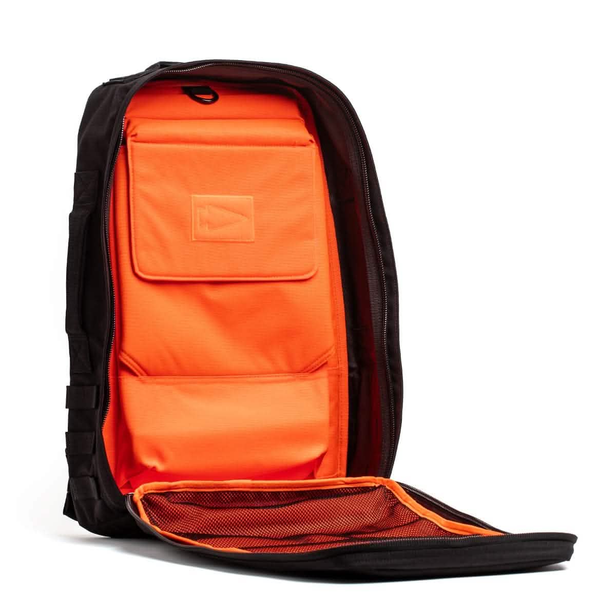Black backpack with bright orange interior and mesh pocket, men's lifestyle gear
