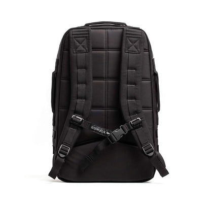 Back view of black GORUCK 25L rucker backpack with padded straps for men