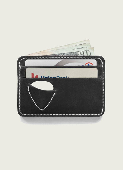 Slim black leather card holder with white stitching, holding cash and credit cards, men's accessory