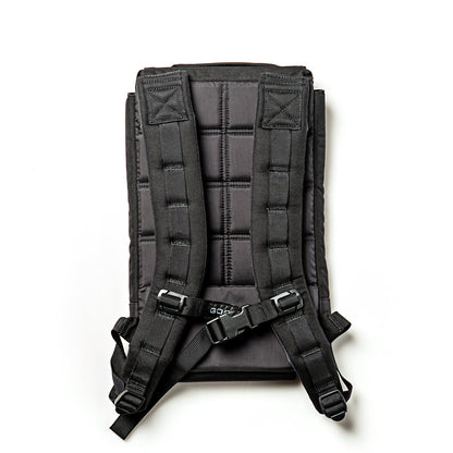 Black tactical weight vest with padded straps and durable stitching on white background