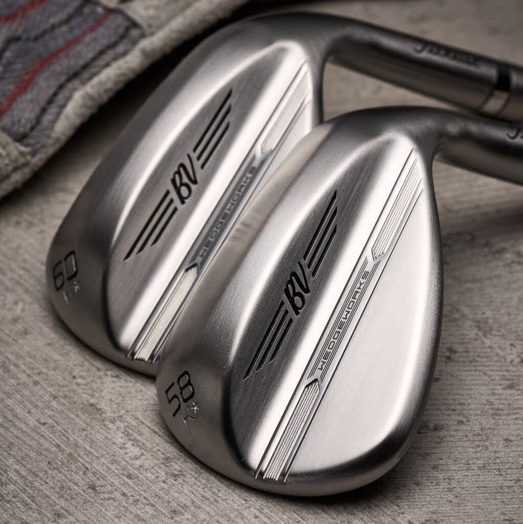 Polished Titleist BV WedgeWorks golf clubs for men on wood surface, stylish lifestyle gear
