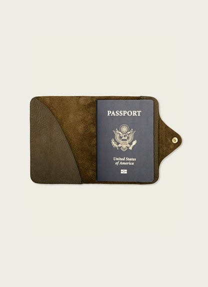 Olive leather passport wallet open with a US passport inside, men's travel accessory by MANN