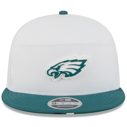 White and teal Philadelphia Eagles snapback cap with logo on a white background