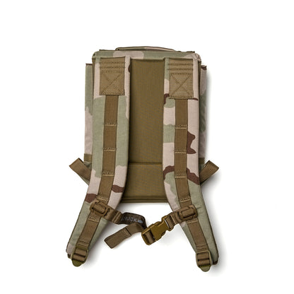 Camouflage men's backpack with padded straps and tan accents, photographed on white