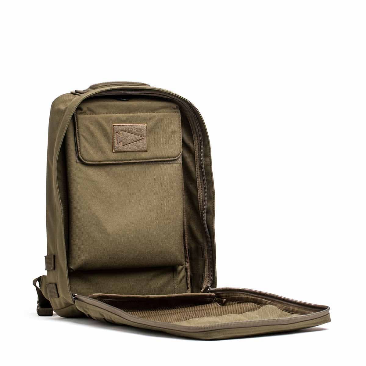 Ranger green tactical backpack open, showing large inner compartments, stylish men’s gear
