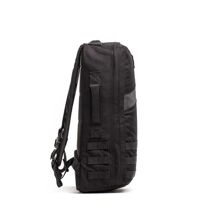 Men's black tactical backpack with side handle and webbing, minimalist background