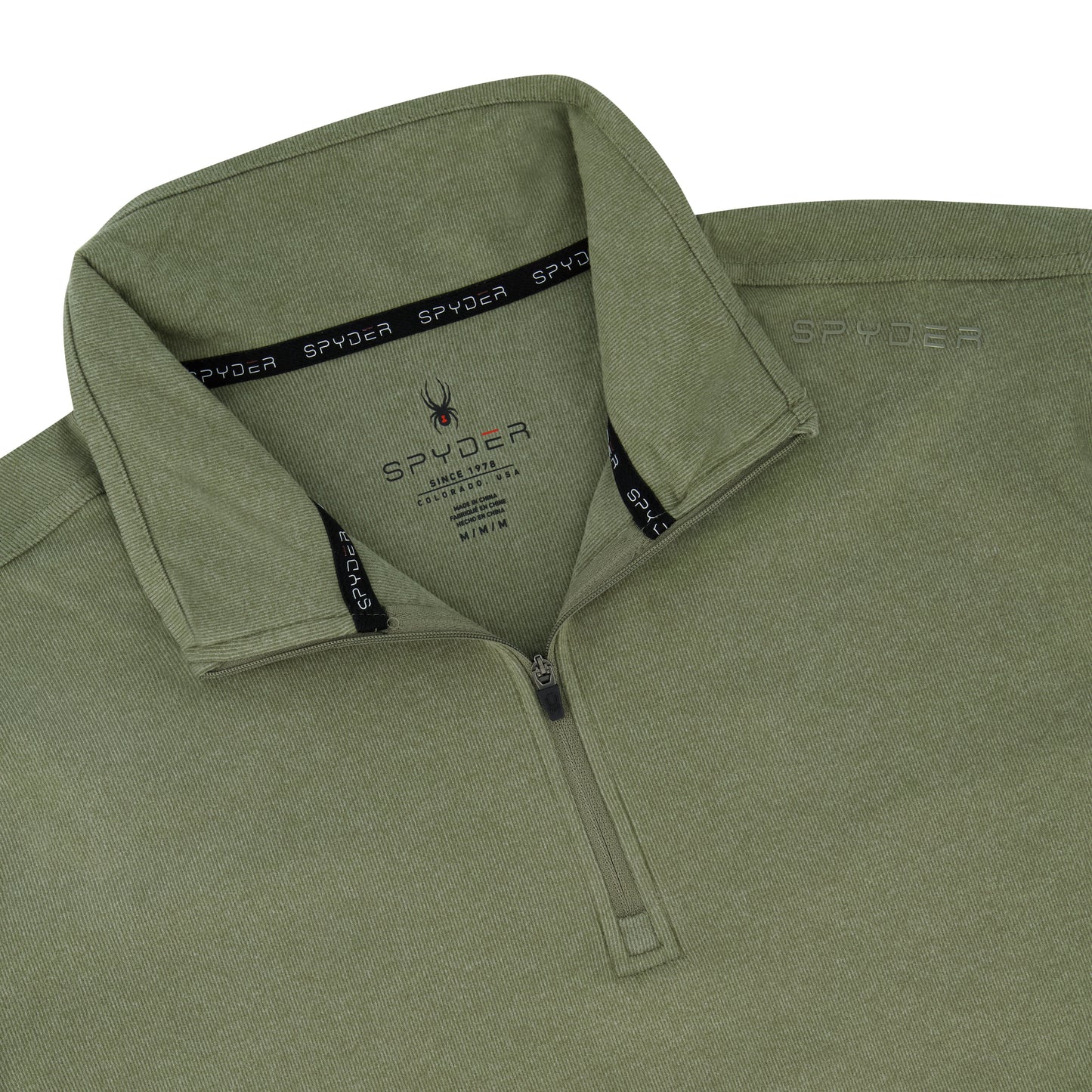 Green polo shirt with Spyder logo on a white background