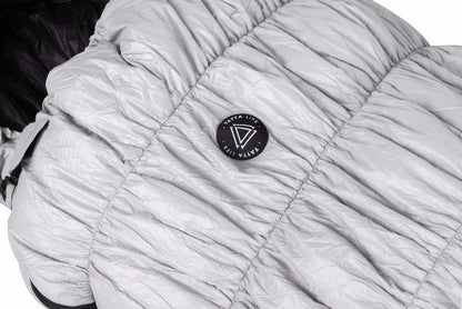 Grey goose down sleeping bag with Yatta Life logo, lightweight and weather-resistant for outdoor adventures.
