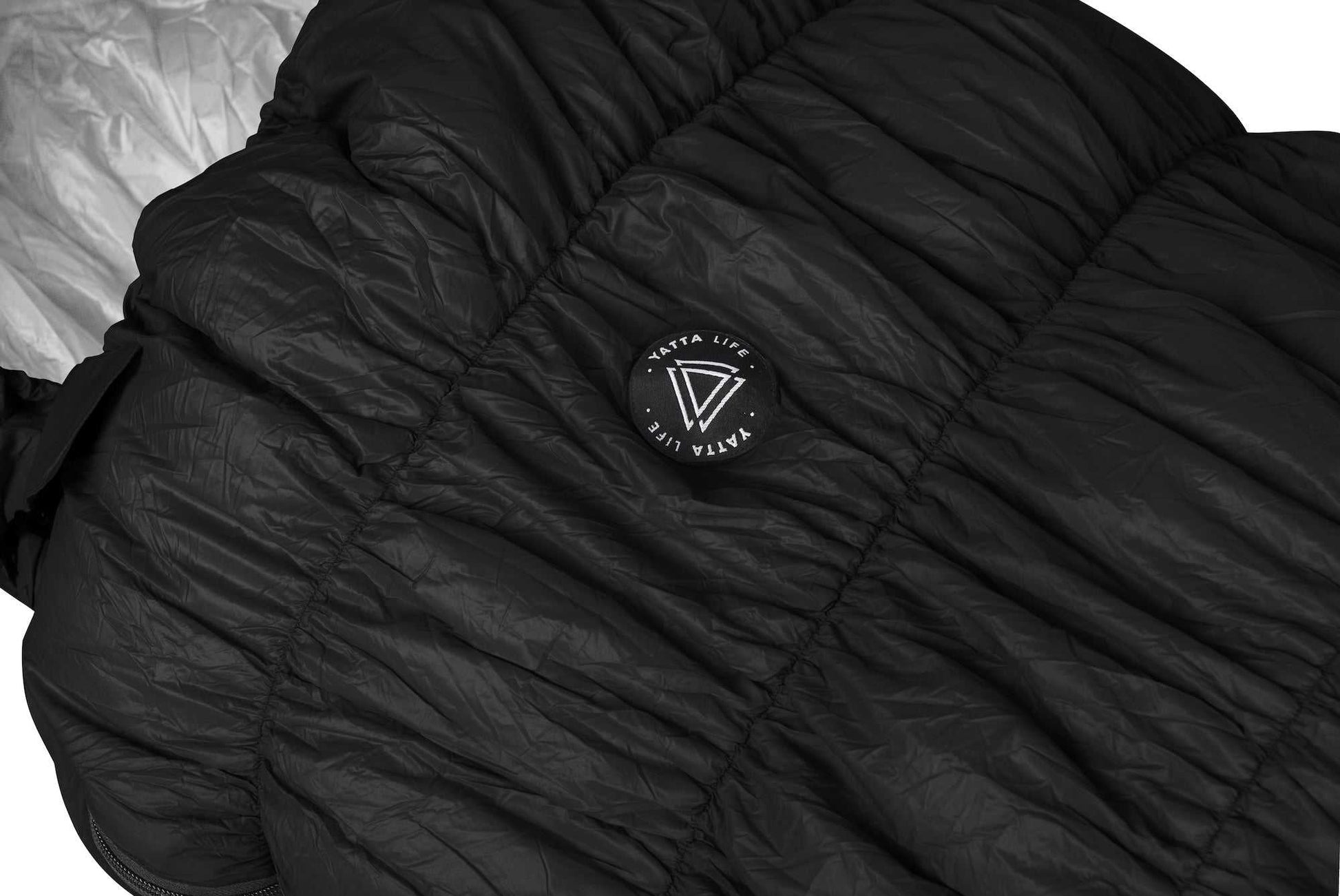 Black goose down sleeping bag with Yatta Life logo, durable nylon fabric, designed for all-season comfort and warmth.