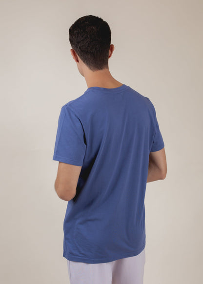 Back view of man wearing blue basic tee, casual men's fashion by MANN