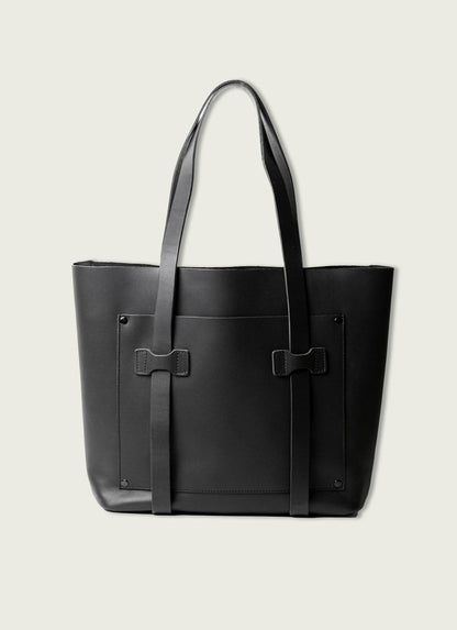 Black leather cargo tote bag with dual shoulder straps, minimalist men's accessory