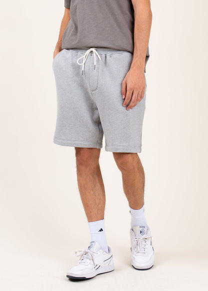 Men's casual grey drawstring shorts paired with white sneakers and socks, MANN fashion