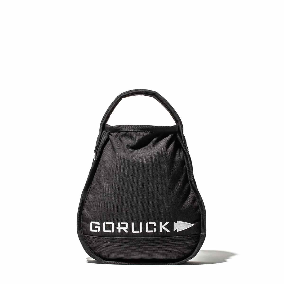 GORUCK black sandbag with handle, men's fitness gear on white background