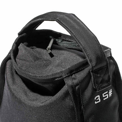 Black sandbag with handles and '35#' text, men's fitness gear from MANN marketplace