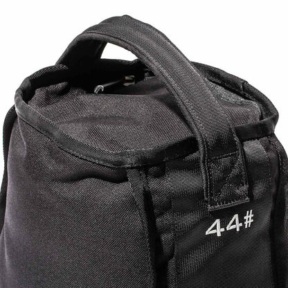 Close-up of black gym sandbag with handle and '44#' embroidered, men's fitness gear
