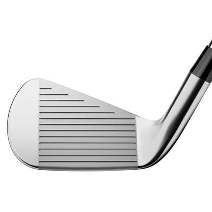 Close-up of a polished metal golf club iron head on white background, men's lifestyle gear